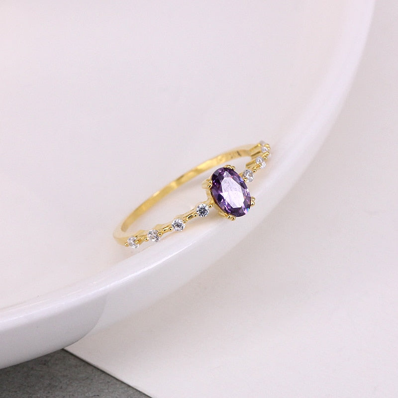 Simple Egg Shape Purple Crystal Gold Rings