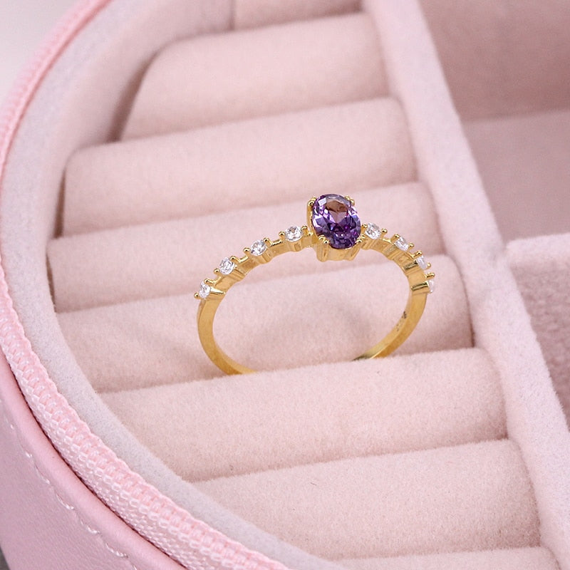 Simple Egg Shape Purple Crystal Gold Rings